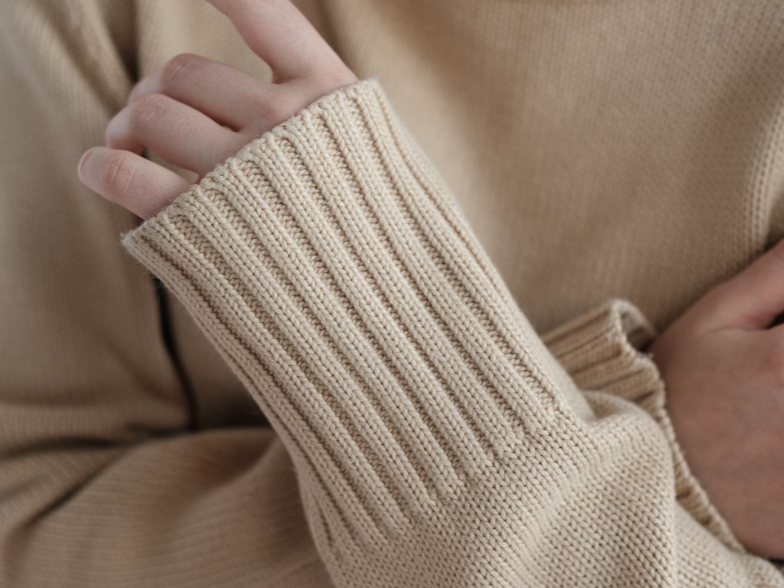 The cuff of a knitted sleeve, close up