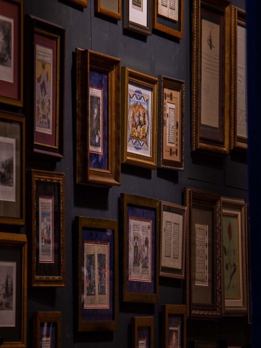 A framed print on a wall, 1